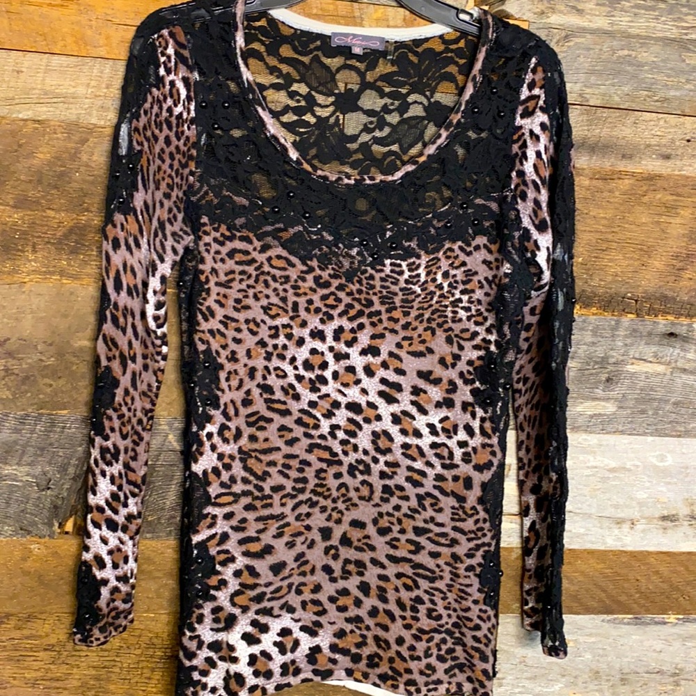 Black, beaded, leopard skin sweater with lace.